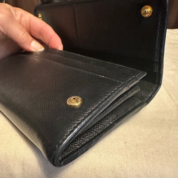 Prada wallet 7.5 x 3.5 black in excellent condition. Absolutely beautiful. - Picture 6 of 9
